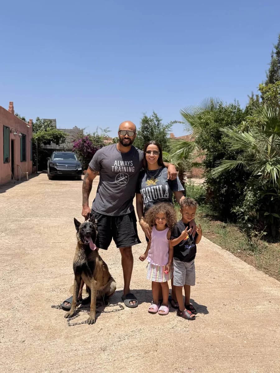 Jas Leverette with his wife, two kids and his dog